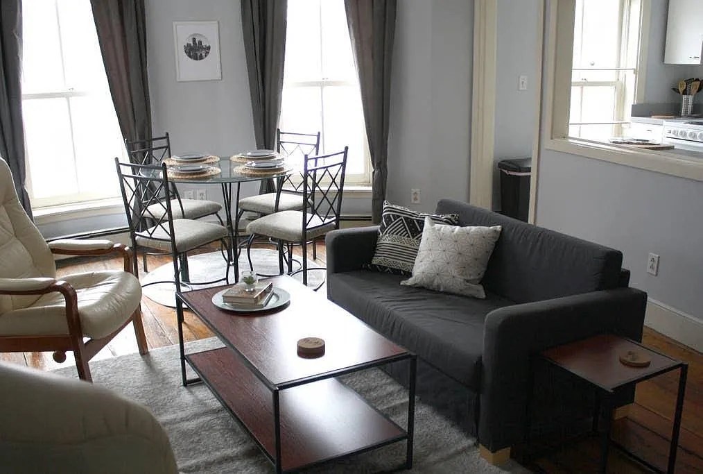 231 Shawmut Avenue, Unit 1 Boston, MA 02118 - Photo 17 of 20 a dining room with furniture and wooden floor