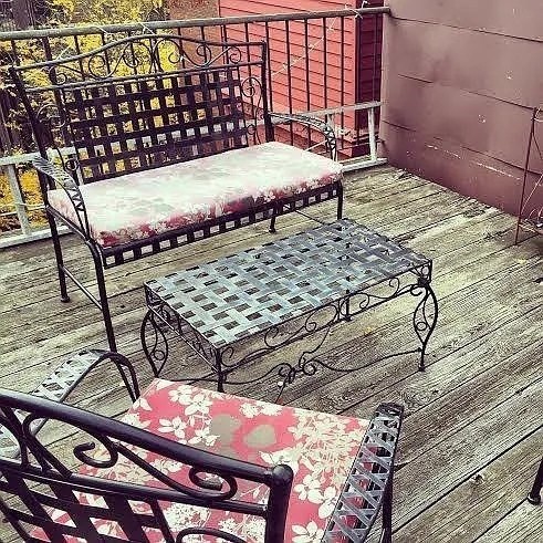 231 Shawmut Avenue, Unit 1 Boston, MA 02118 - Photo 20 of 20 a bed sitting in a bedroom next to a window