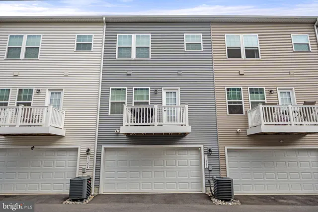 a front view of a building with a street