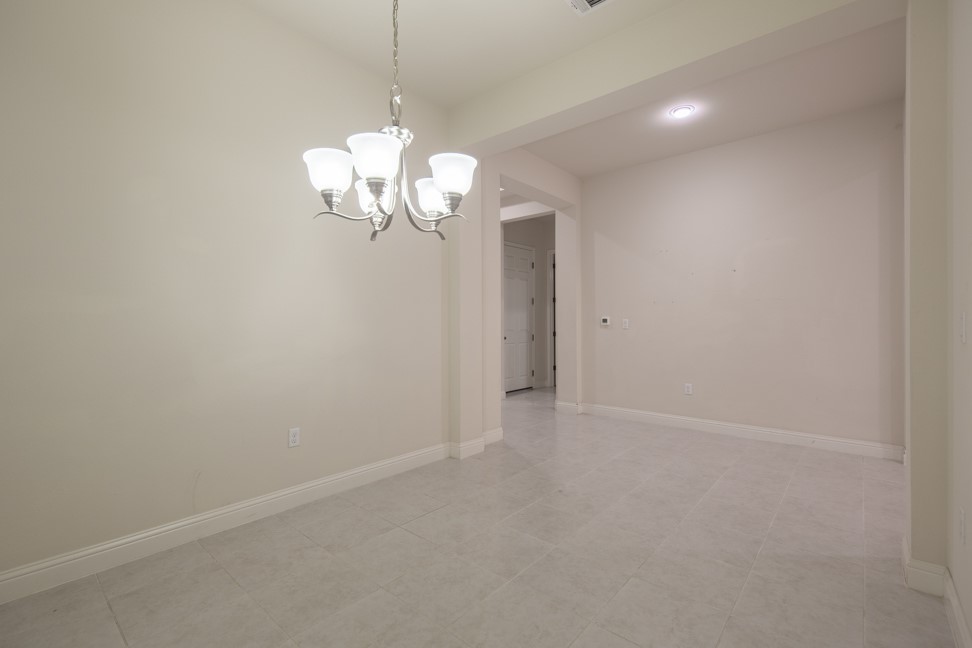 14928 Iveans Way Austin, TX 78717 - Photo 11 of 28 a view of a chandelier in big room