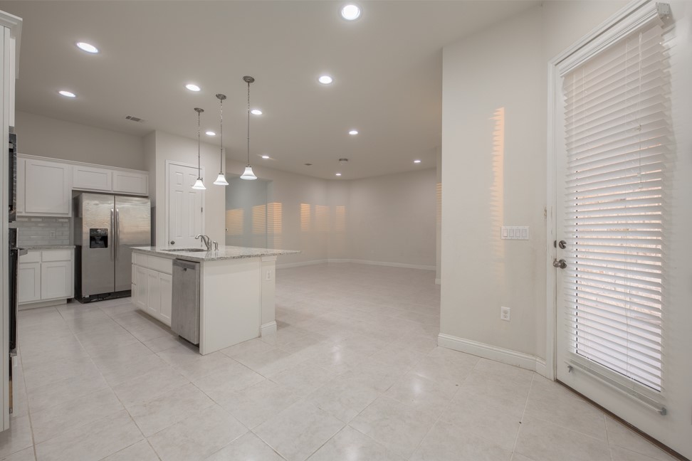 14928 Iveans Way Austin, TX 78717 - Photo 17 of 28 a view of kitchen with white cabinets