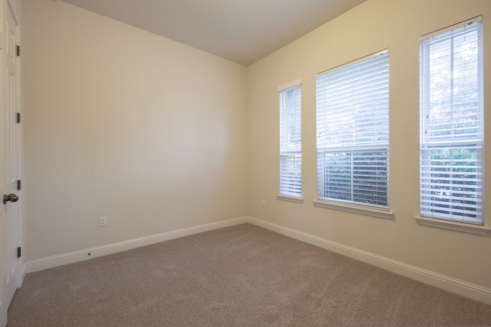14928 Iveans Way Austin, TX 78717 - Photo 2 of 28 a room that has a window in it