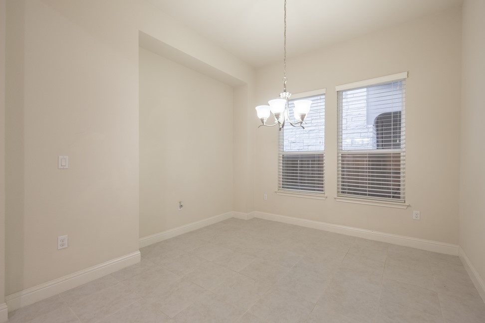 14928 Iveans Way Austin, TX 78717 - Photo 10 of 28 a view of an empty room with a window