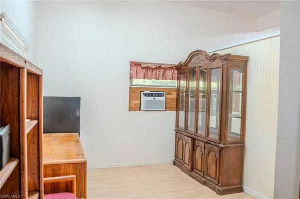 a view of workspace with wooden floor