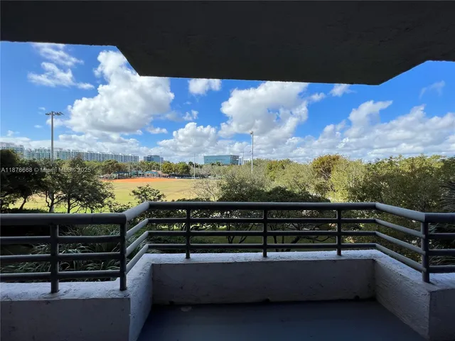 a view of a balcony with city view