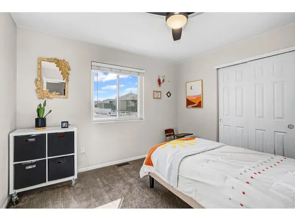 a bathroom with a bathtub sink and mirror