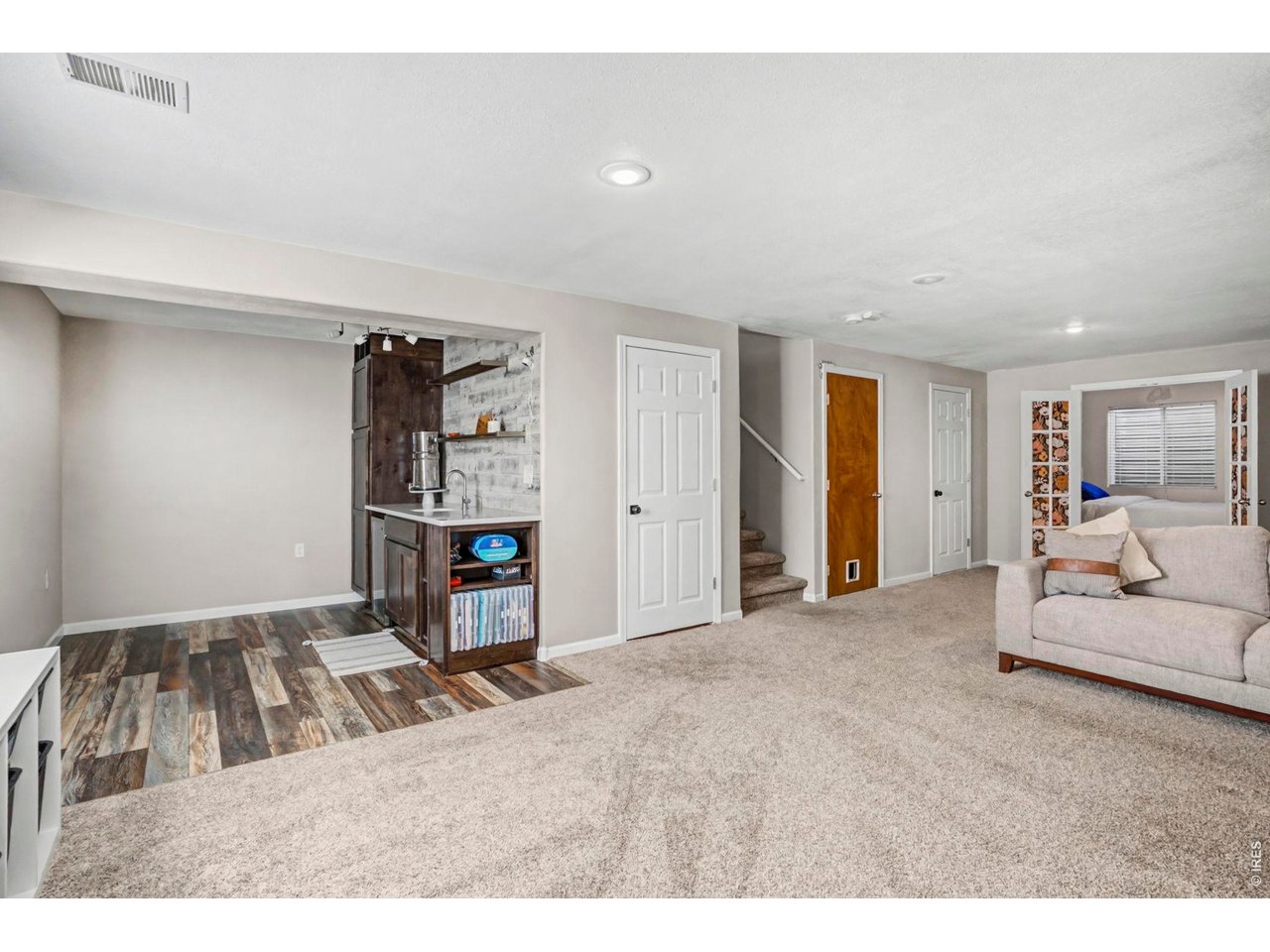 1313 Park Ridge Drive Severance, CO 80615 - Photo 27 of 43 Rec room to wet bar area