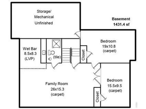 a bedroom with a bed and a table in it