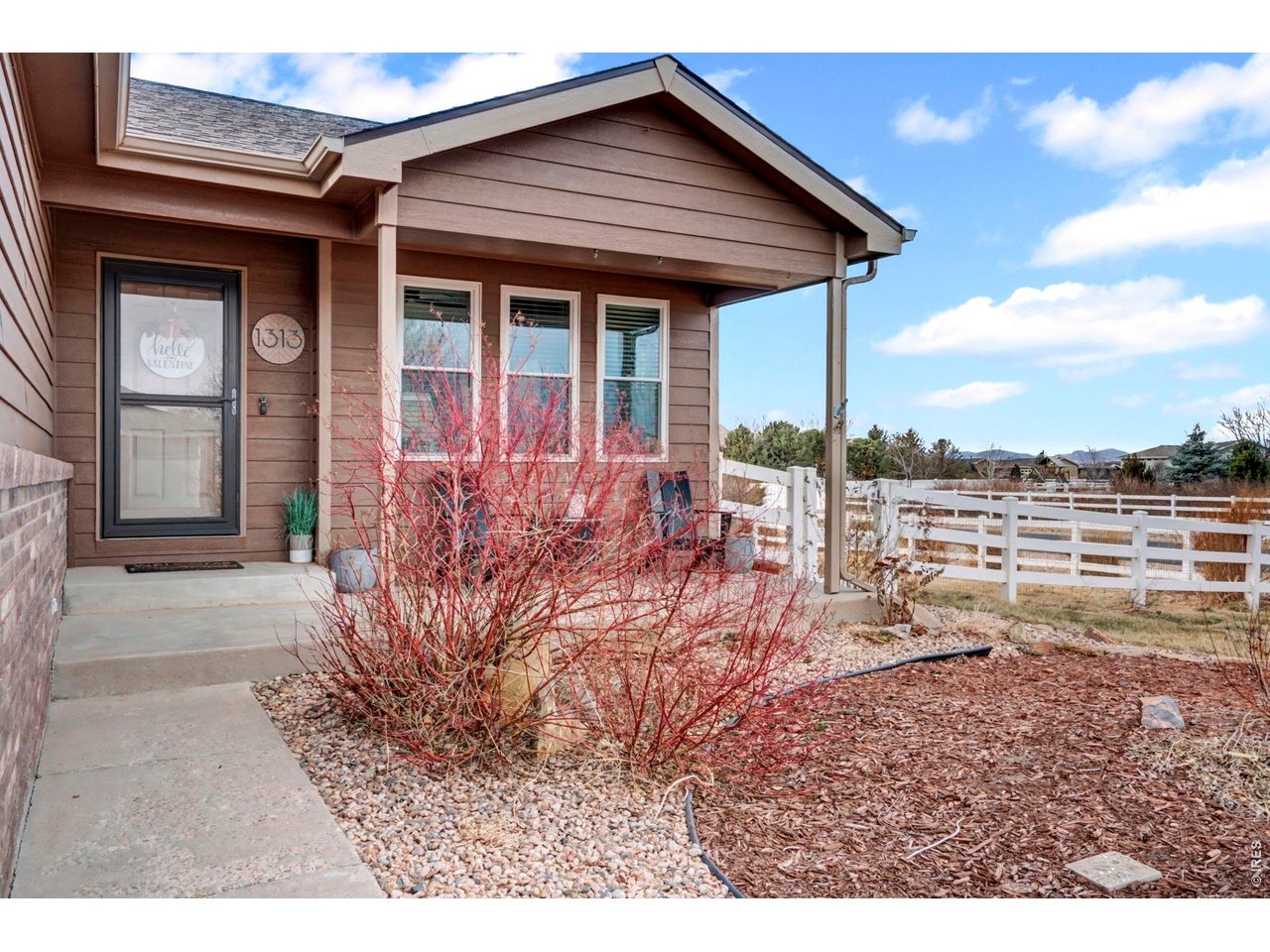 1313 Park Ridge Drive Severance, CO 80615 - Photo 4 of 43 Relax on the covered front porch
