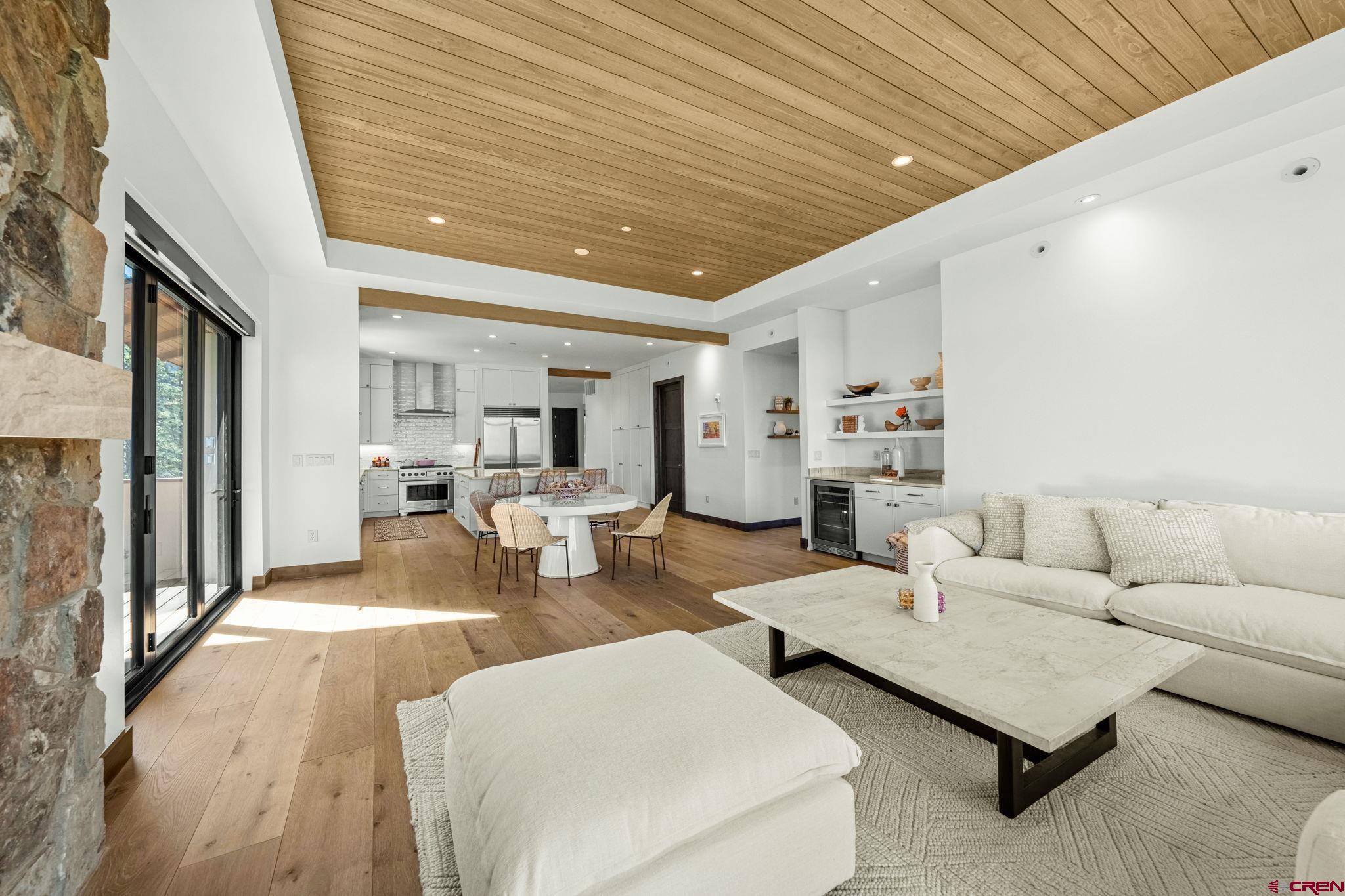 136 Outlaw Drive, Unit 3B Durango, CO 81301 - Photo 13 of 45 a living room with furniture and a table