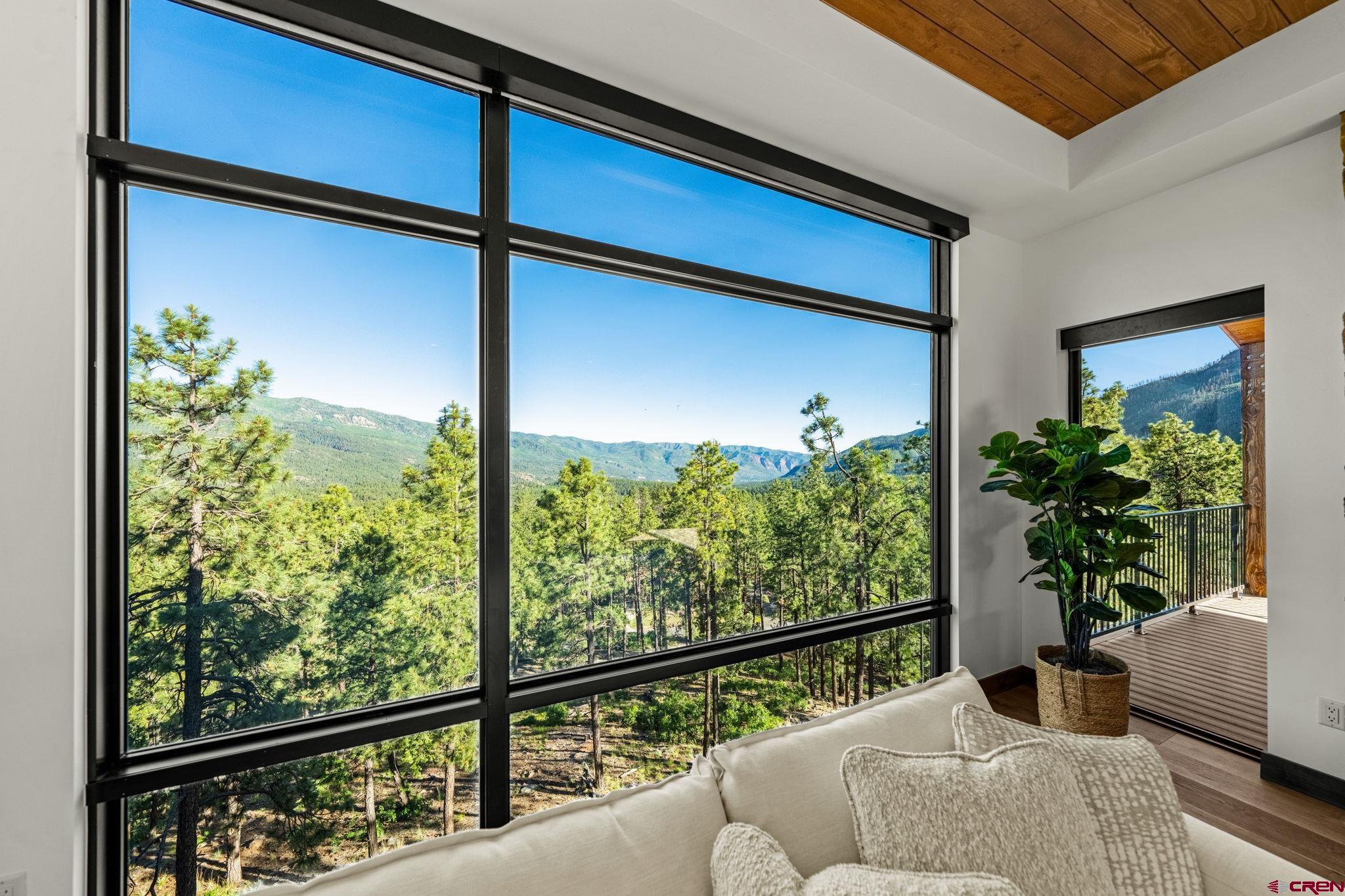 136 Outlaw Drive, Unit 3B Durango, CO 81301 - Photo 20 of 45 a balcony with furniture and a potted plant