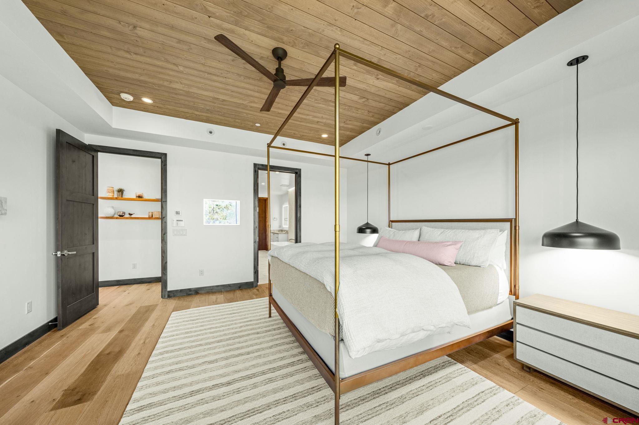 136 Outlaw Drive, Unit 3B Durango, CO 81301 - Photo 30 of 45 a bed room with a bed and a balcony