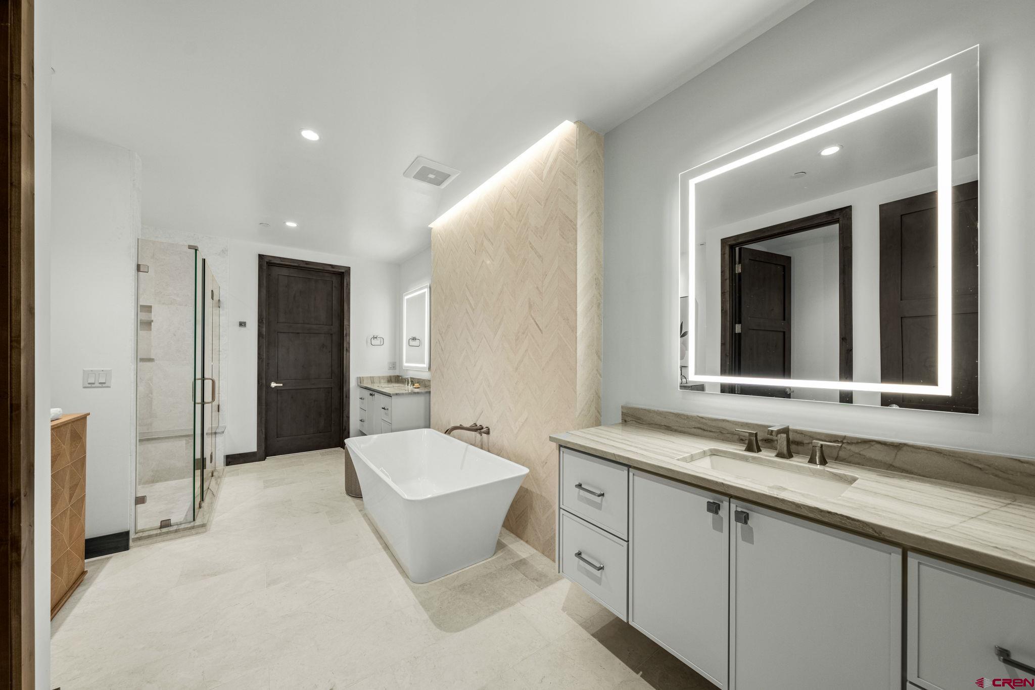 136 Outlaw Drive, Unit 3B Durango, CO 81301 - Photo 31 of 45 a spacious bathroom with a double vanity sink mirror and double