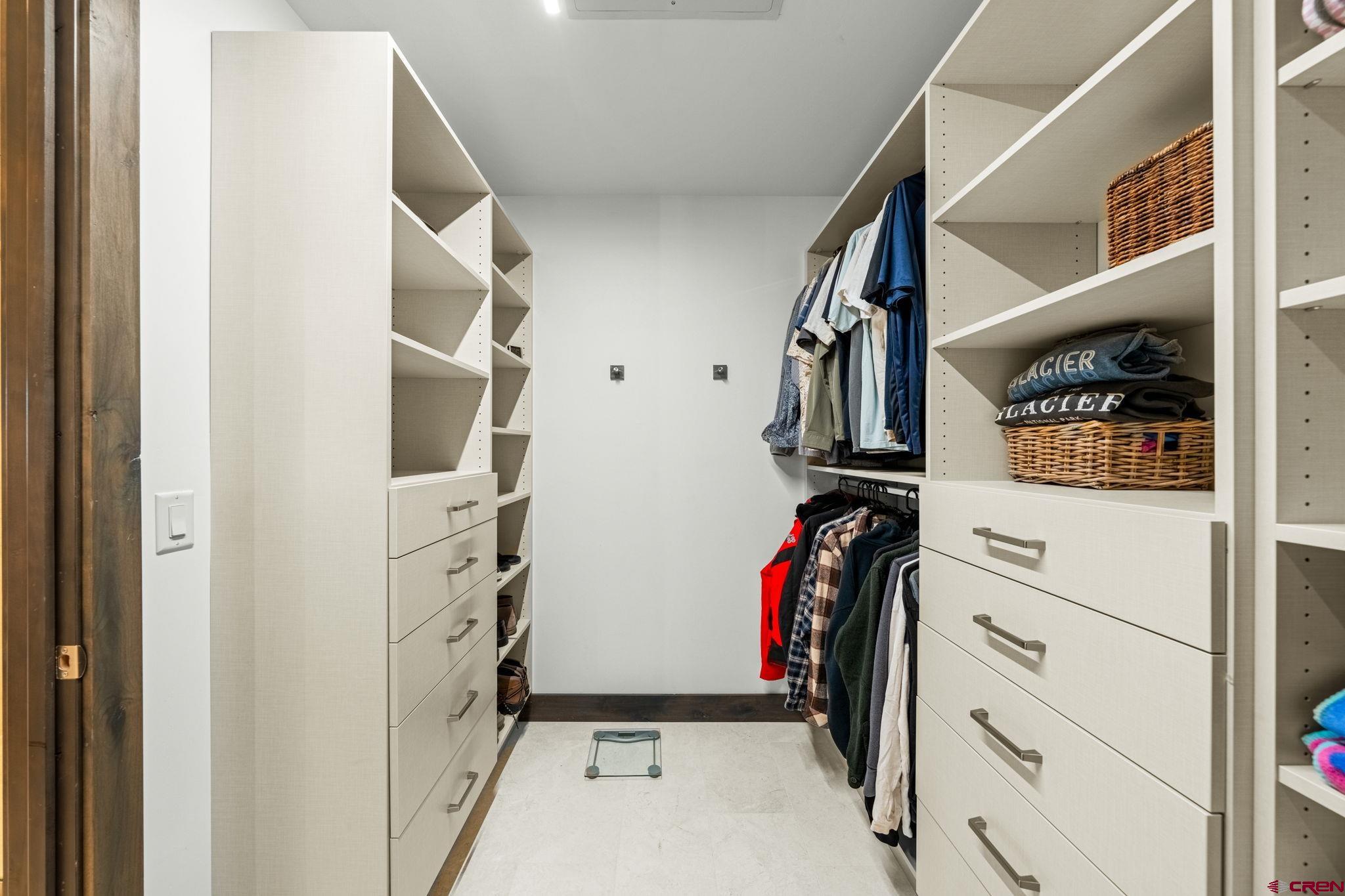 136 Outlaw Drive, Unit 3B Durango, CO 81301 - Photo 34 of 45 a view of walk in closet with clothes and shoes