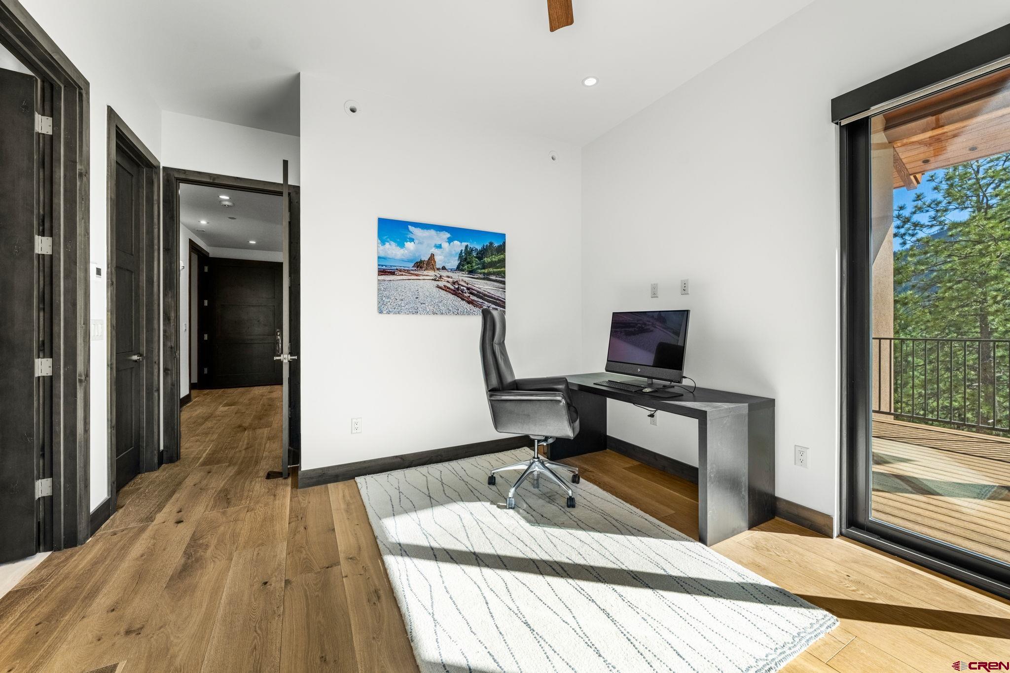 136 Outlaw Drive, Unit 3B Durango, CO 81301 - Photo 35 of 45 a workspace with furniture and a window