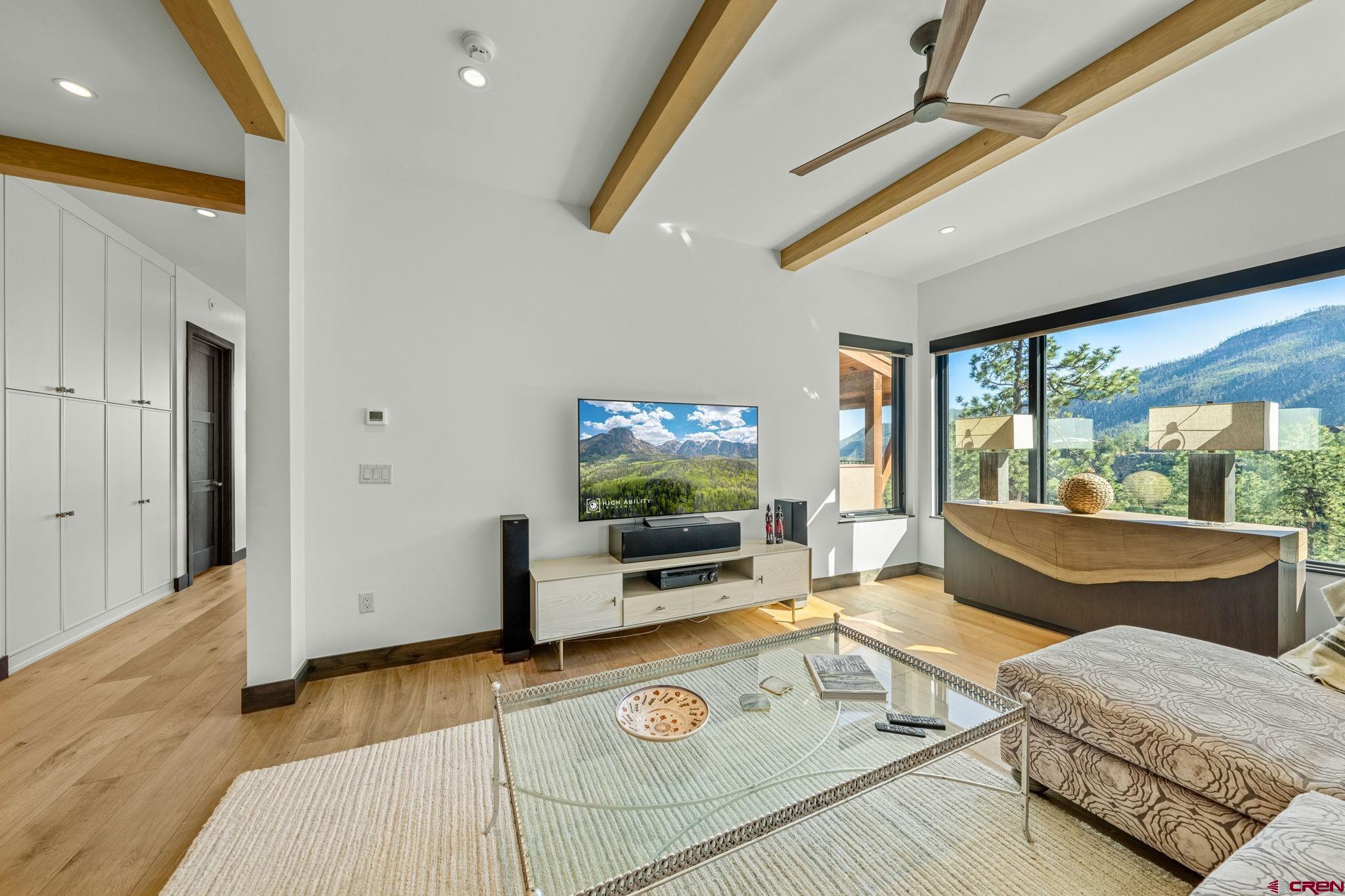 136 Outlaw Drive, Unit 3B Durango, CO 81301 - Photo 8 of 45 a living room with furniture and a flat screen tv