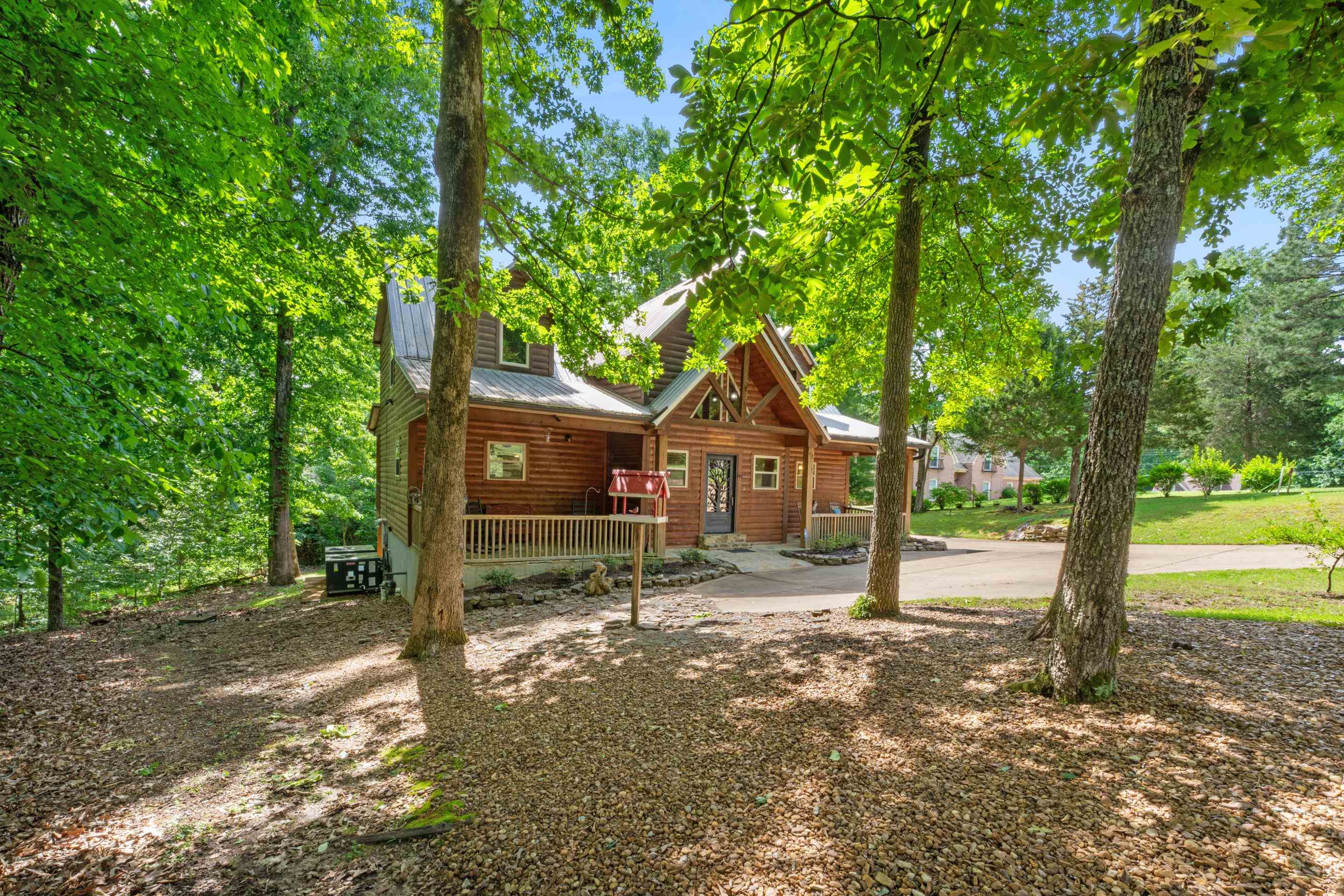 950 Cherry Road Eads, TN 38028 - Photo 28 of 30 Wood-sided home with a metal roof and front porch