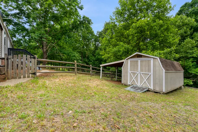a view of backyard with green space