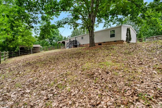 a house with a tree in front of it