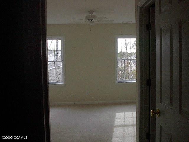 4513 Country Club Road, Unit B202 Morehead City, NC 28557 - Photo 8 of 10 master bedroom