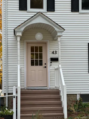 a front view of a house with a window