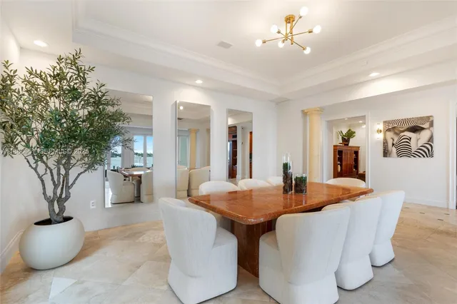 a spacious bedroom with a bed and a couch