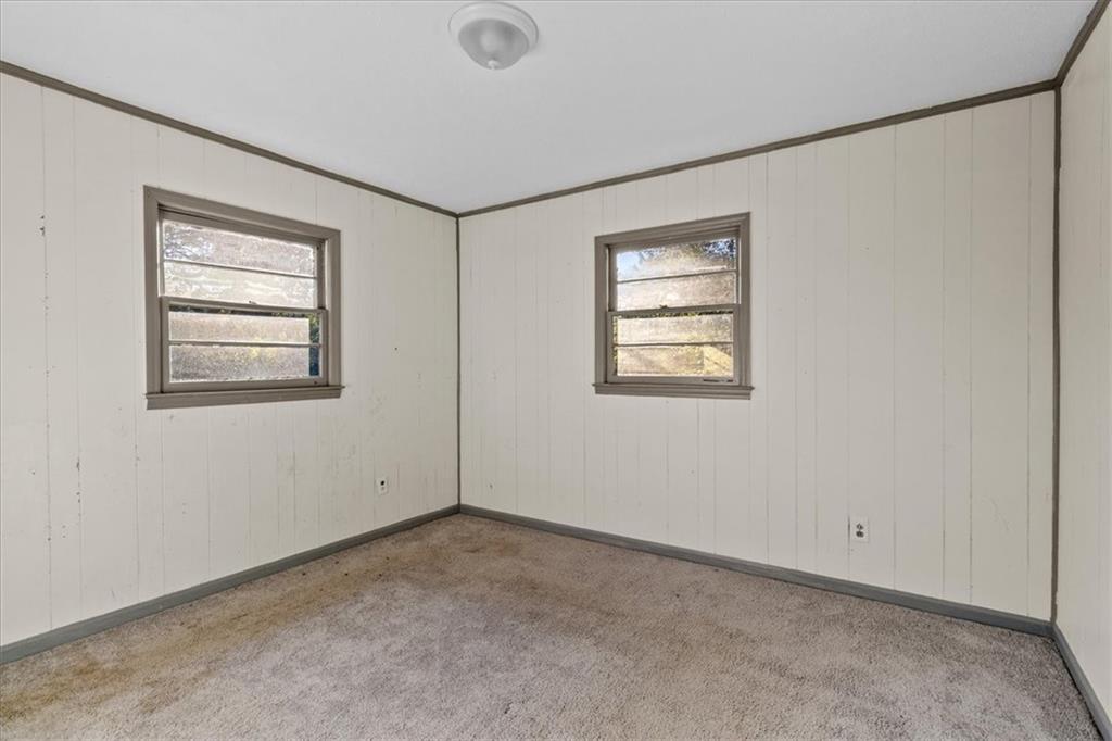 50 Evelyn Road Covington, GA 30016 - Photo 20 of 23 an empty room with windows