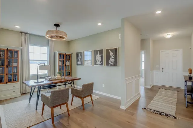 a view of a livingroom with furniture and window