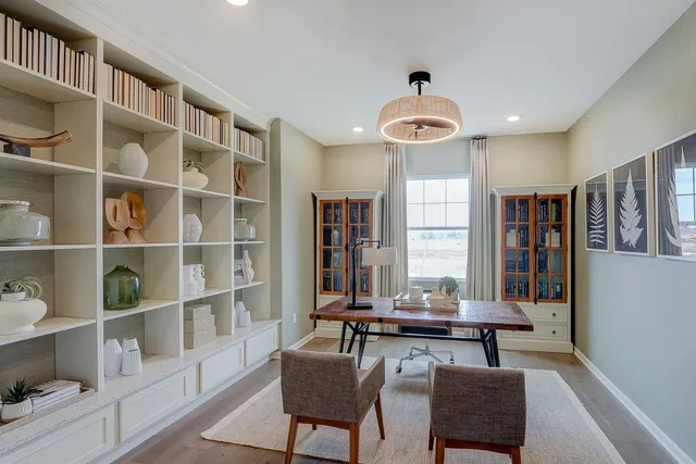 a view of a livingroom with furniture and window