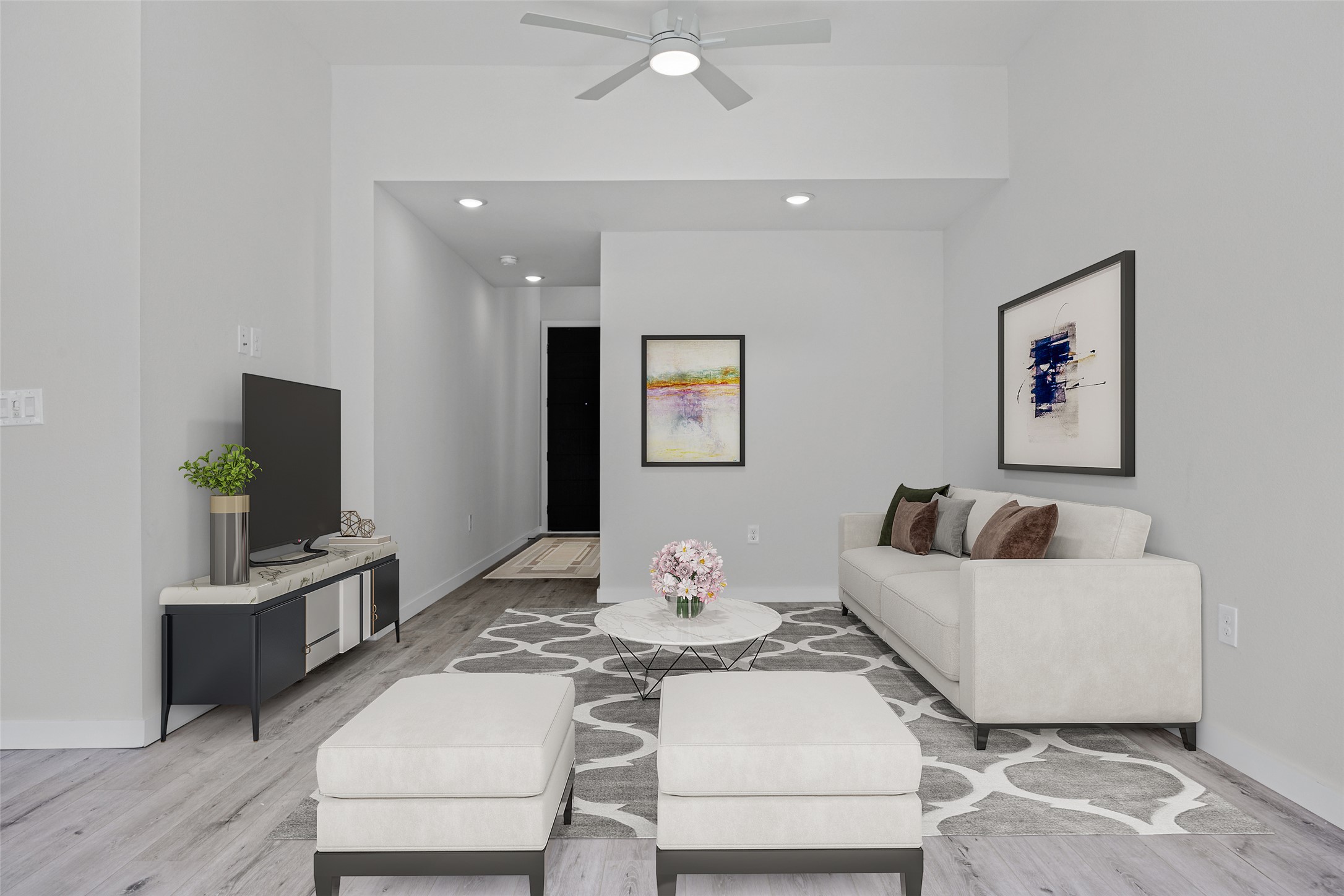 2000 Riverside Farms Road, Unit 5102 Austin, TX 78741 - Photo 5 of 25 An inviting living room features a ceiling fan, recessed lighting, and elegant wood flooring.