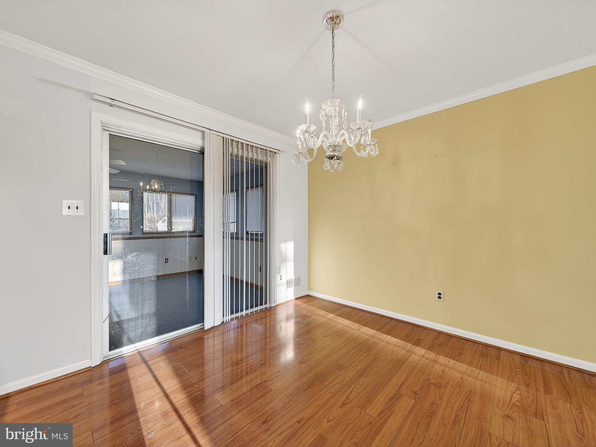 9315 Lees Ridge Road Warrenton, VA 20186 - Photo 13 of 51 wooden floor in an empty room with a window