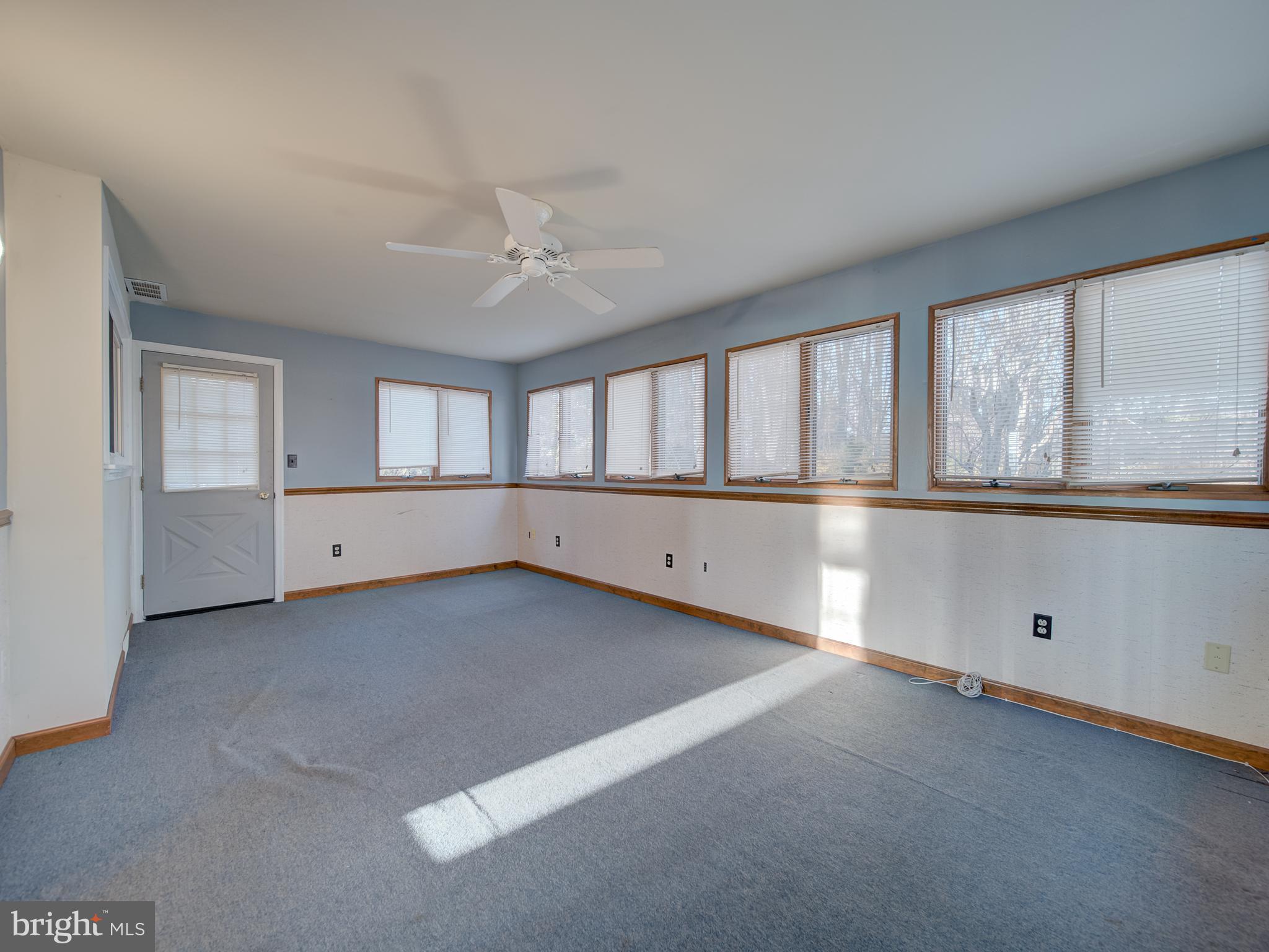 9315 Lees Ridge Road Warrenton, VA 20186 - Photo 16 of 51 a view of an empty room with a window