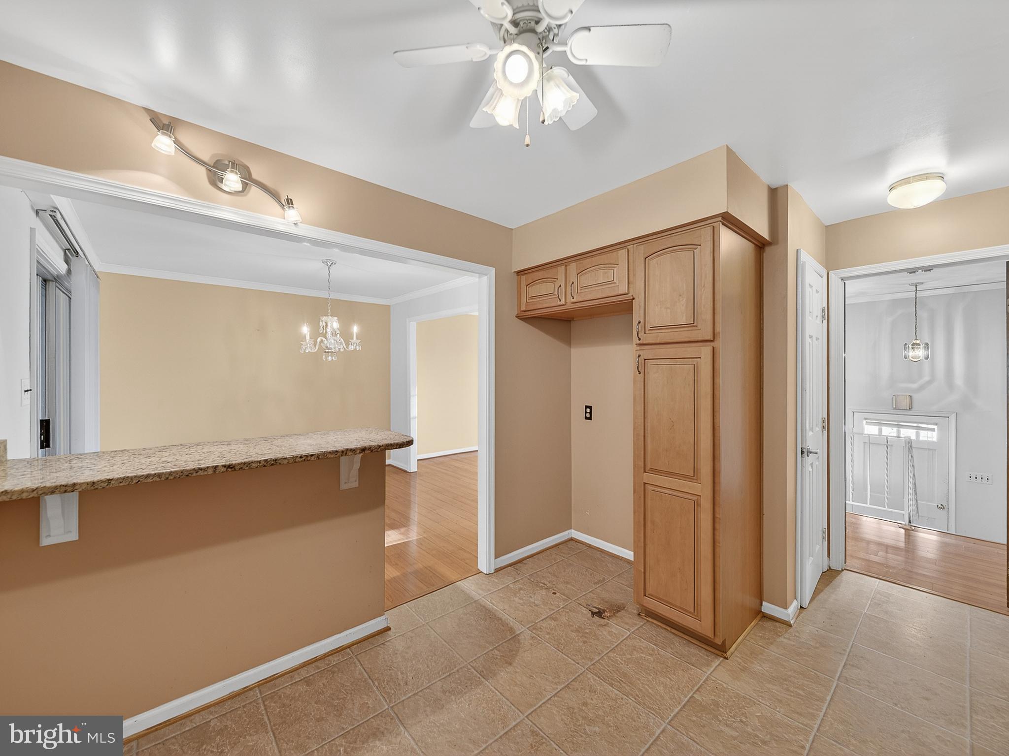 9315 Lees Ridge Road Warrenton, VA 20186 - Photo 29 of 51 a view of a hallway with wooden floor and entryway