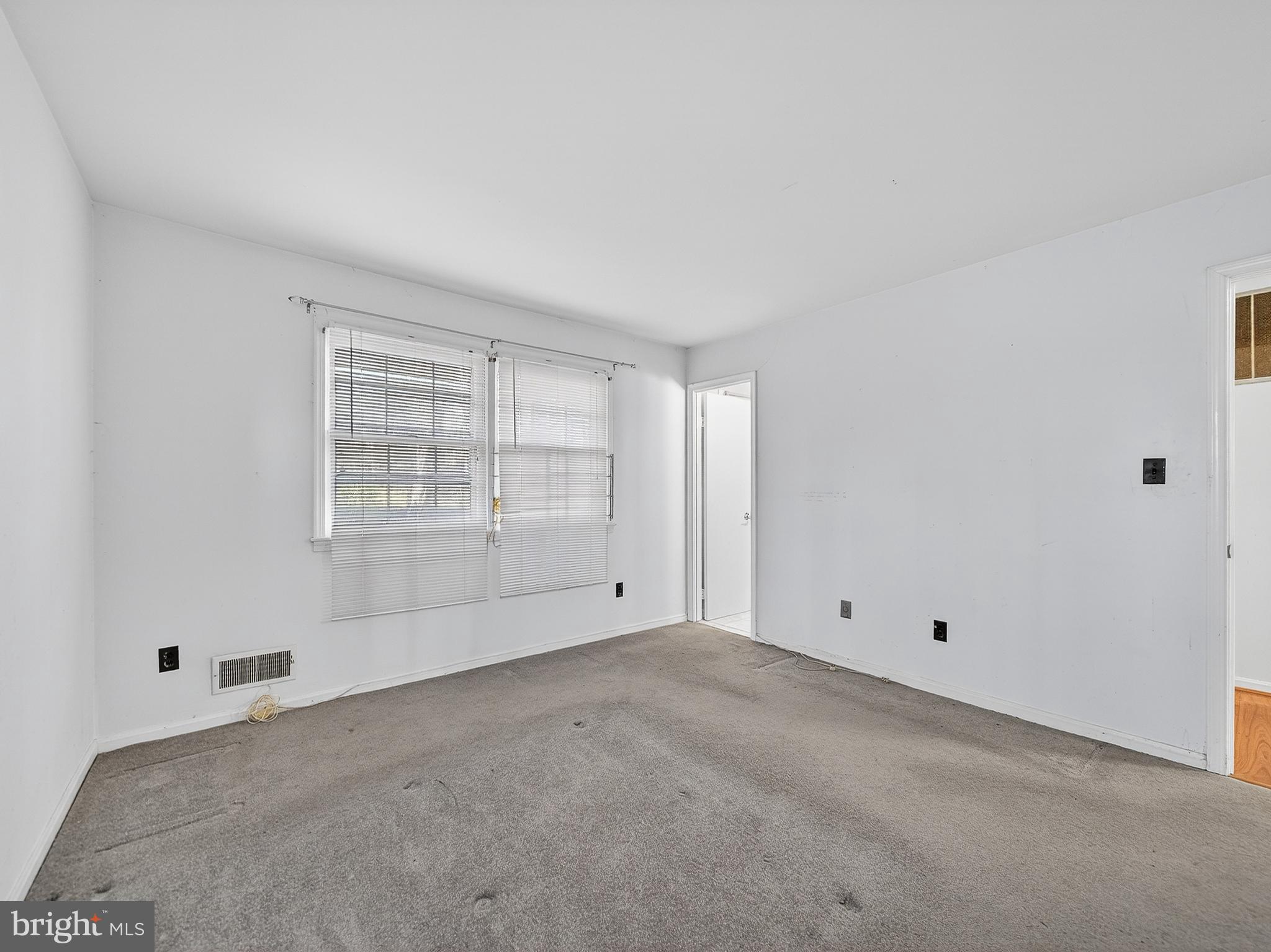 9315 Lees Ridge Road Warrenton, VA 20186 - Photo 37 of 51 a view of an empty room with a window