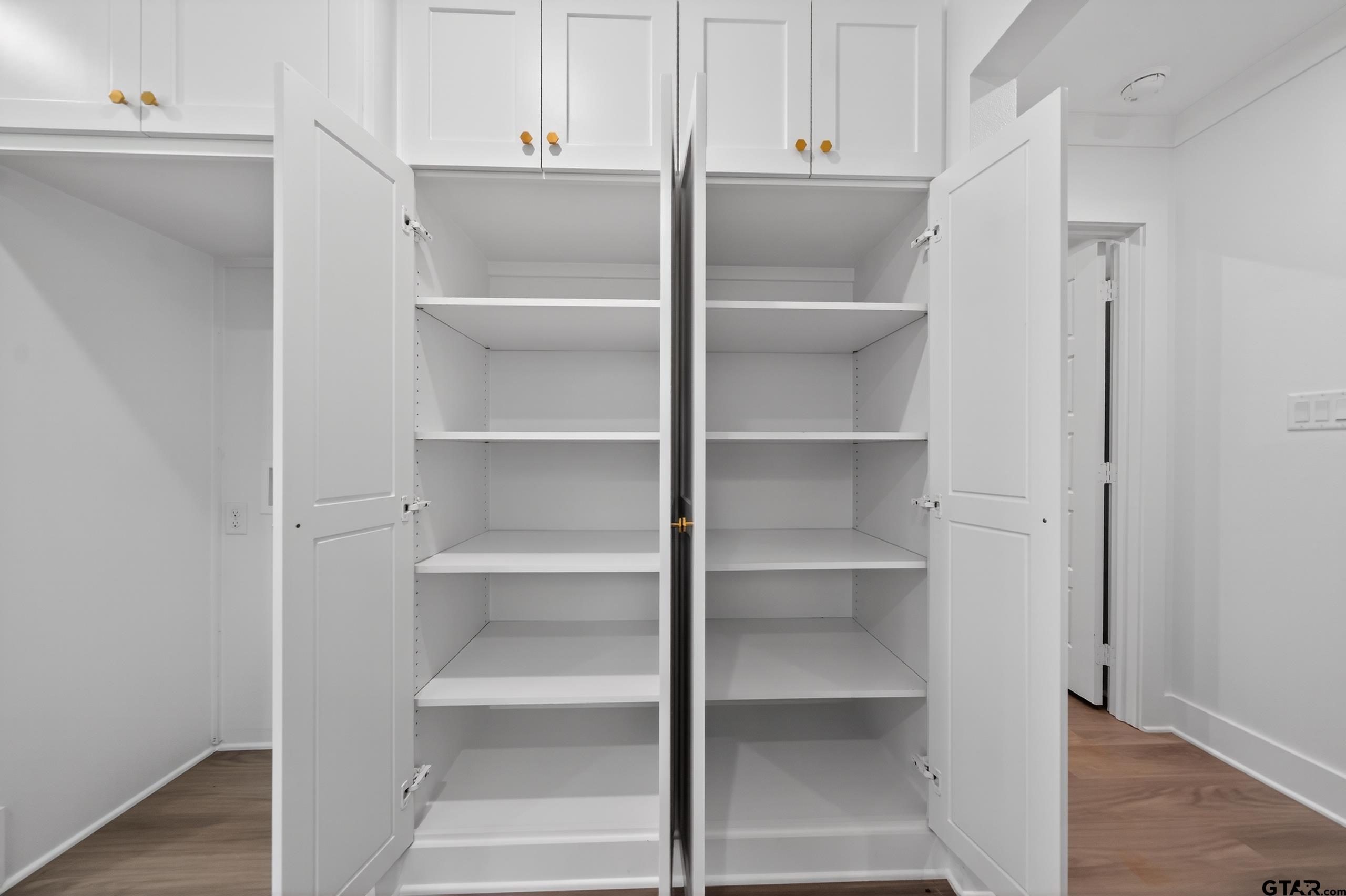 329 Wiley Drive Bullard, TX 75757 - Photo 14 of 31 a view of walk in closet with empty racks