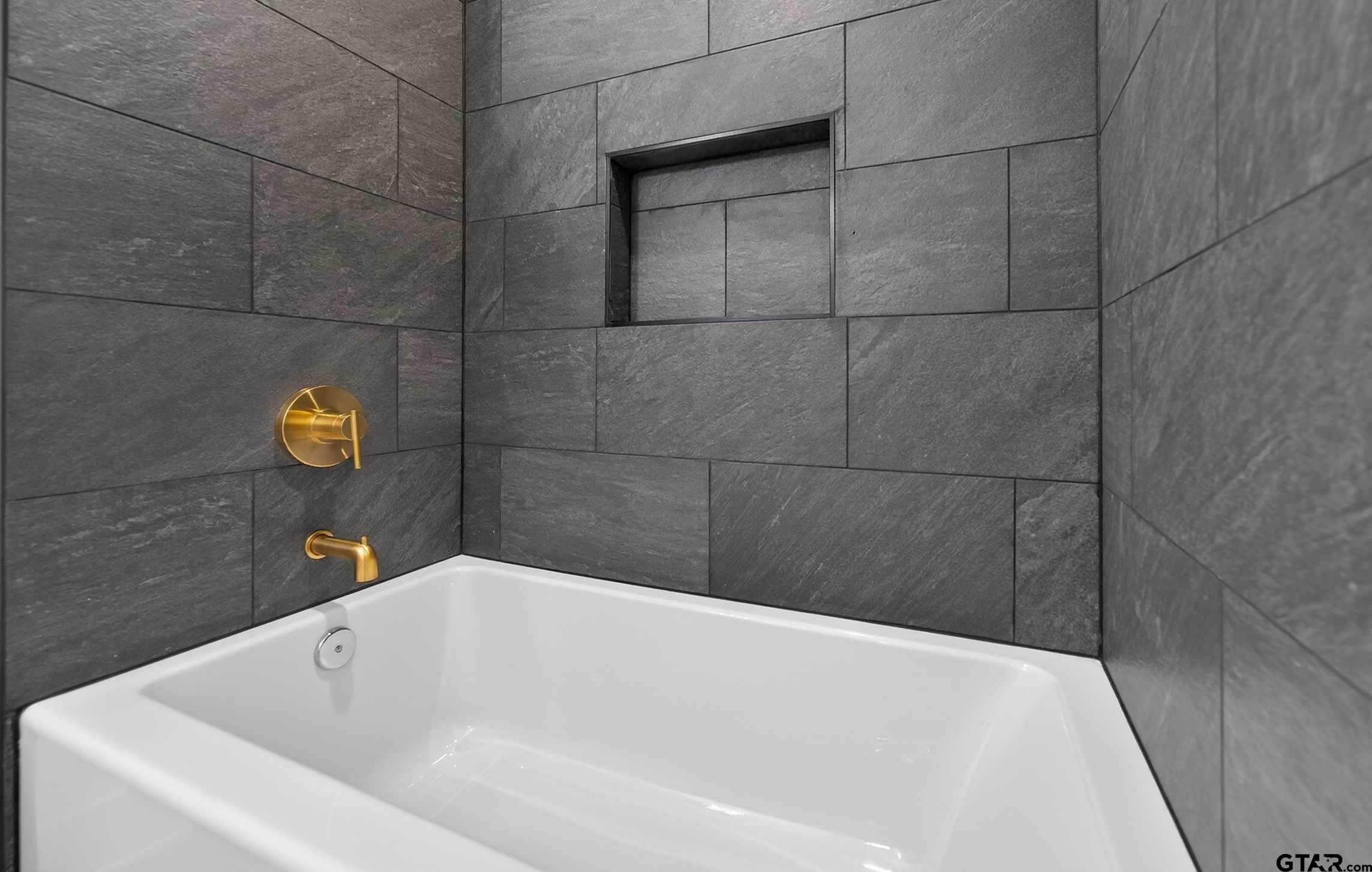 329 Wiley Drive Bullard, TX 75757 - Photo 23 of 31 a bathroom with a bathtub
