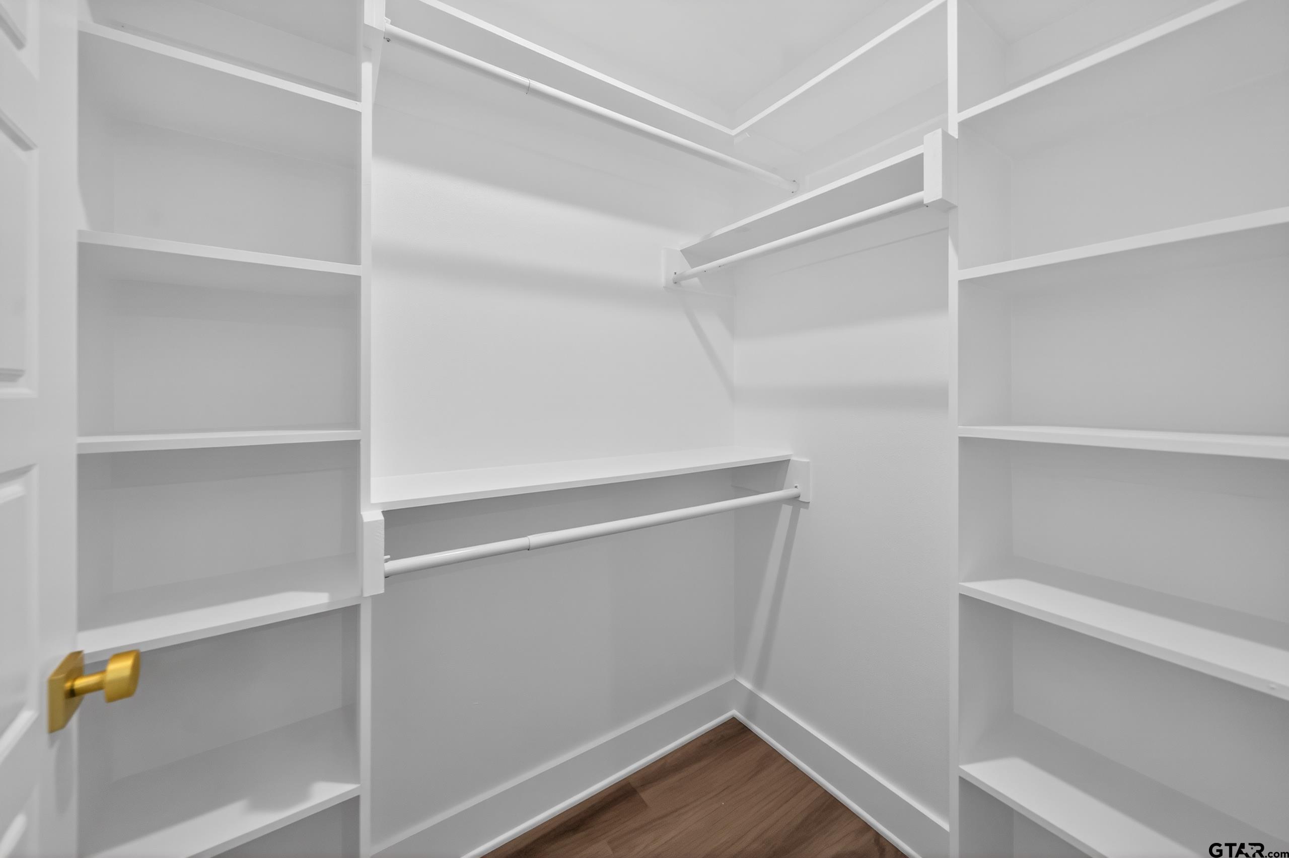 329 Wiley Drive Bullard, TX 75757 - Photo 25 of 31 a view of walk in closet with empty racks