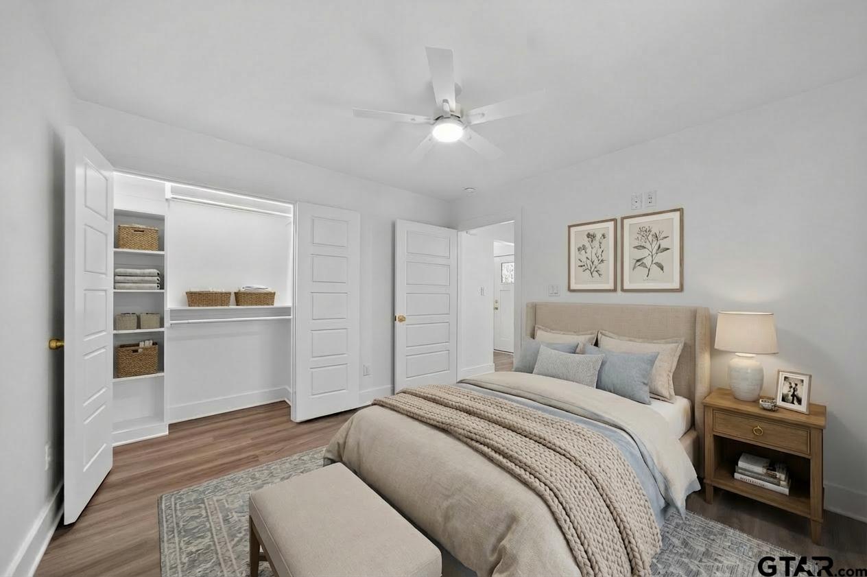 329 Wiley Drive Bullard, TX 75757 - Photo 27 of 31 a bedroom with a bed and a view of kitchen