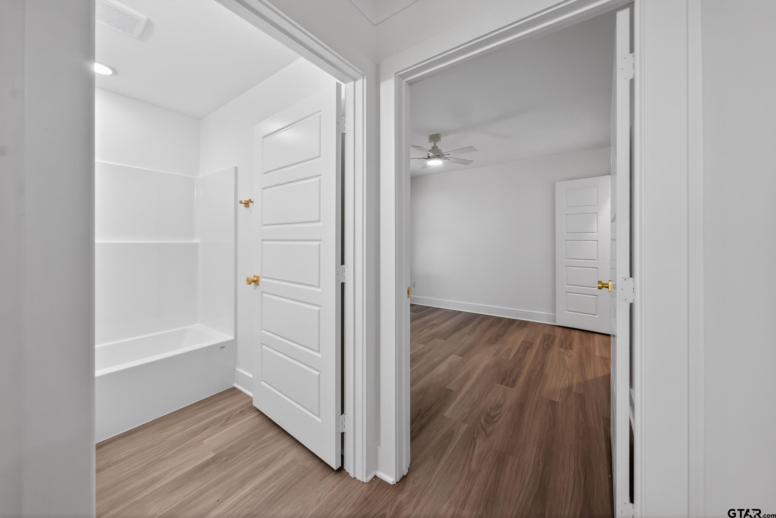 329 Wiley Drive Bullard, TX 75757 - Photo 28 of 31 an empty room with wooden floor