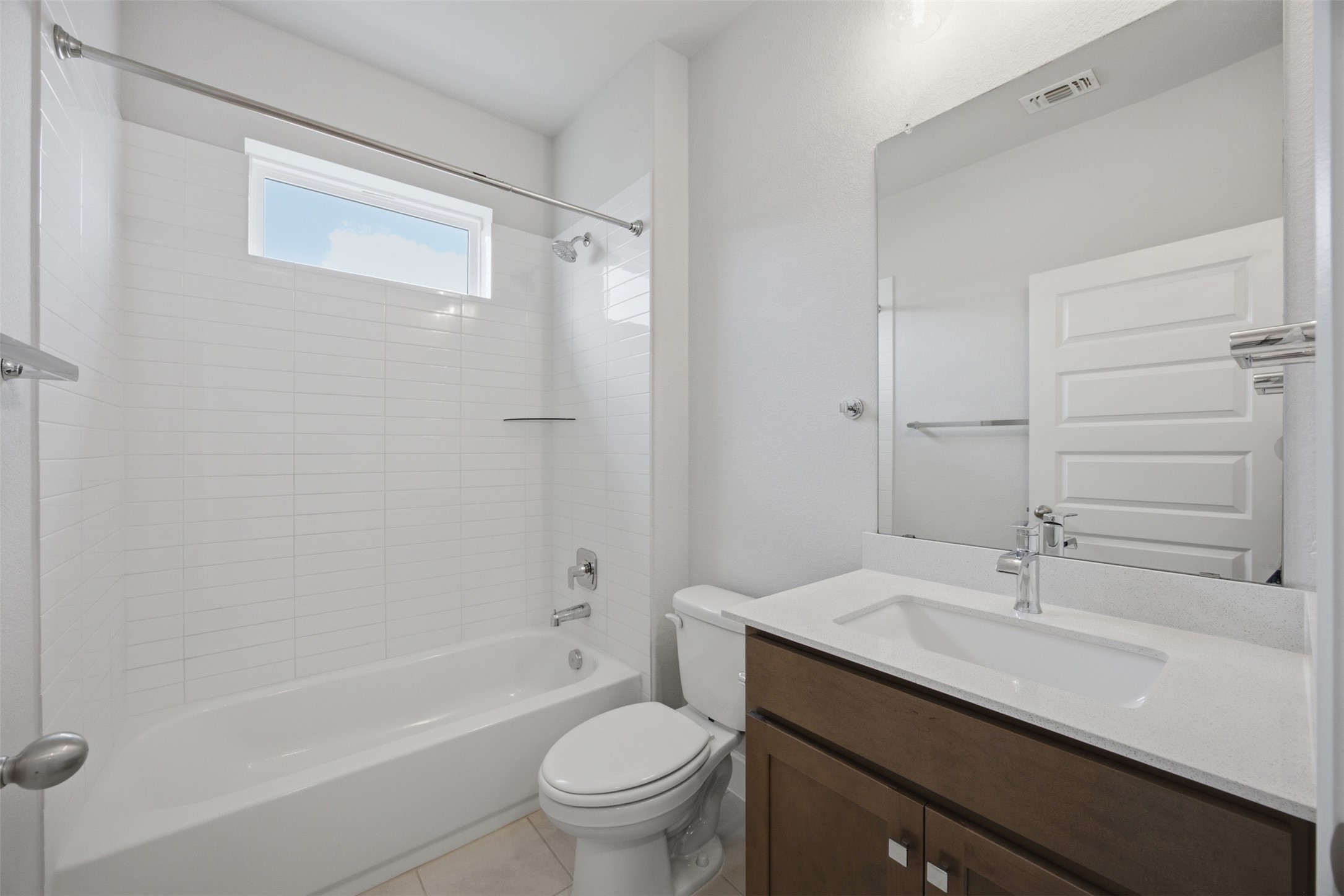 2101 Little Snake Way Georgetown, TX 78633 - Photo 31 of 37 Modern bath with pristine white tiles and ample light.