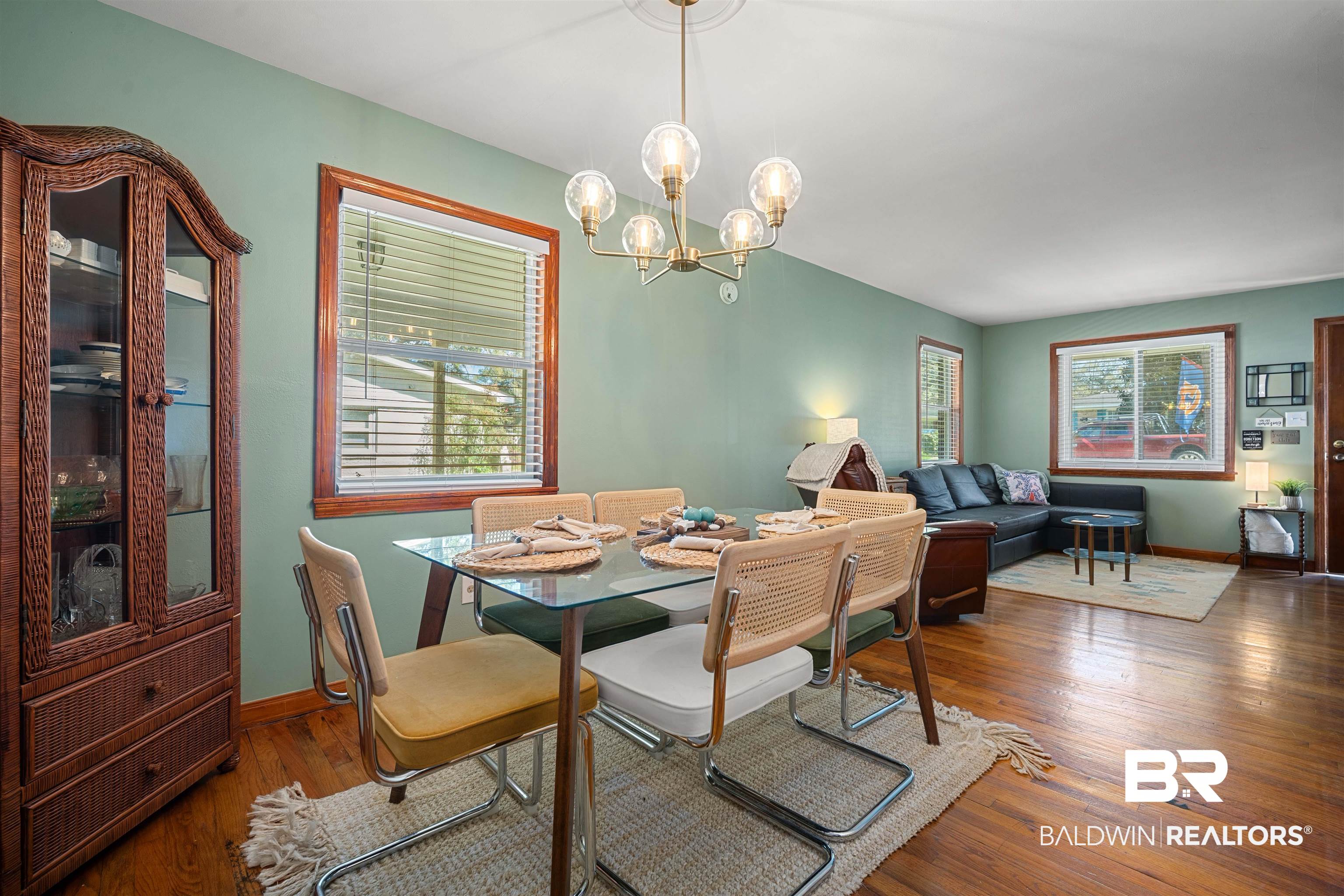 672 Tarawa Drive Mobile, AL 36609 - Photo 13 of 26 Dining space featuring hardwood / wood-style flooring and hanging lights