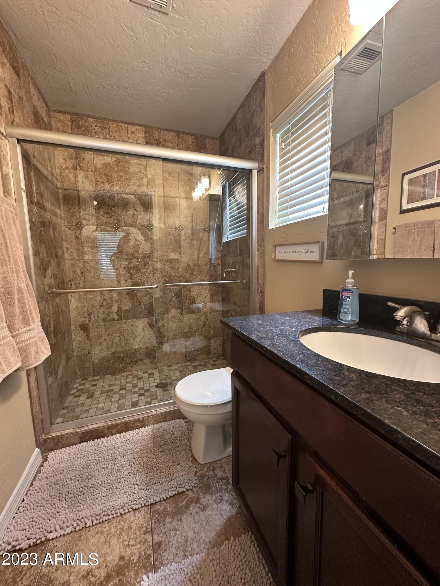 14145 North 92nd Street, Unit 1027 Scottsdale, AZ 85260 - Photo 16 of 30 Master Bathroom