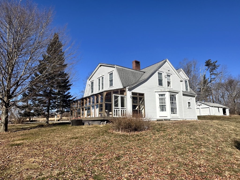78 Ridge Road Hardwick, MA 01037 - Photo 33 of 42 a front view of a house with a garden