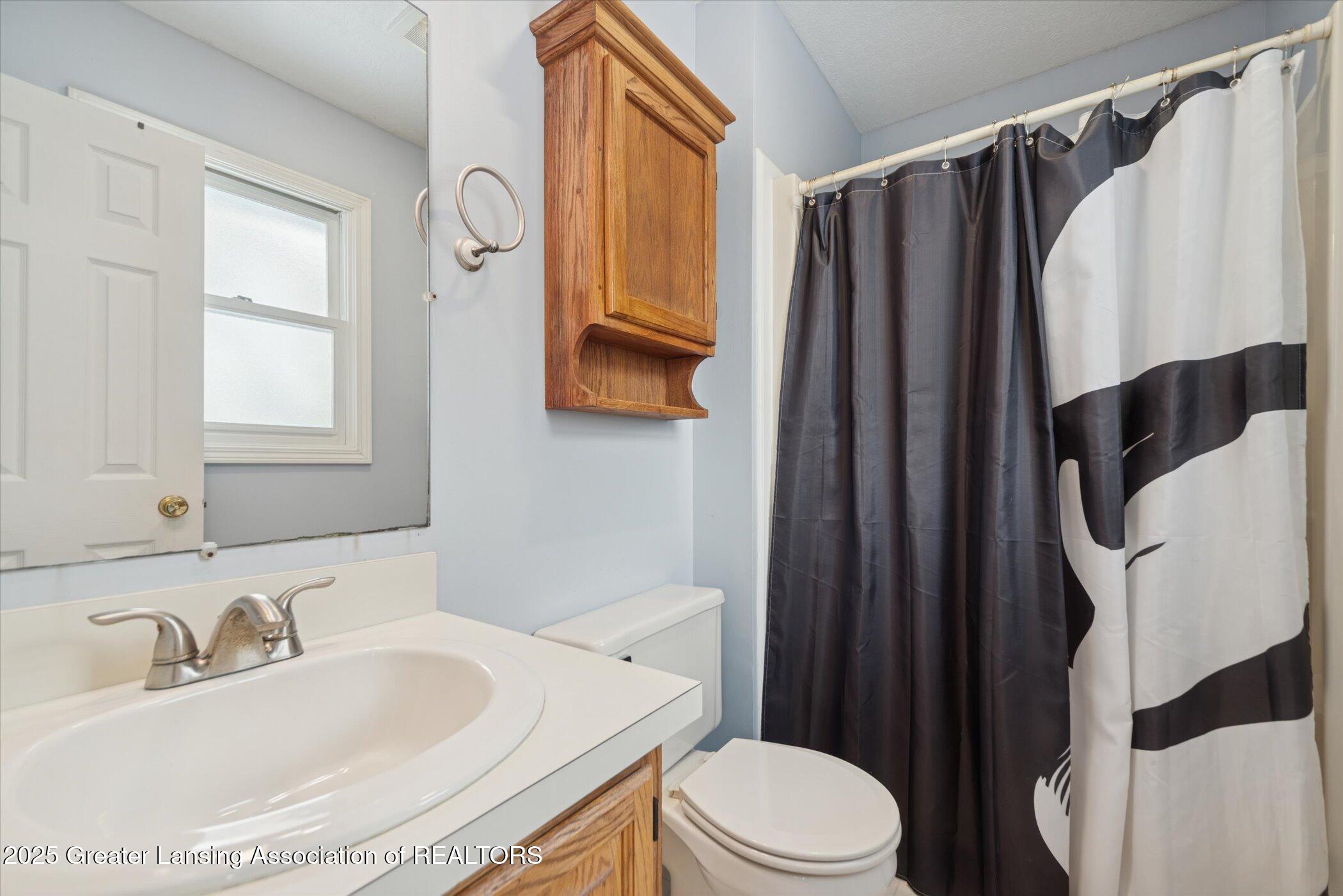 5125 East Clark Road Bath, MI 48808 - Photo 19 of 36 22-5125-Clark-Rd-Windowstill