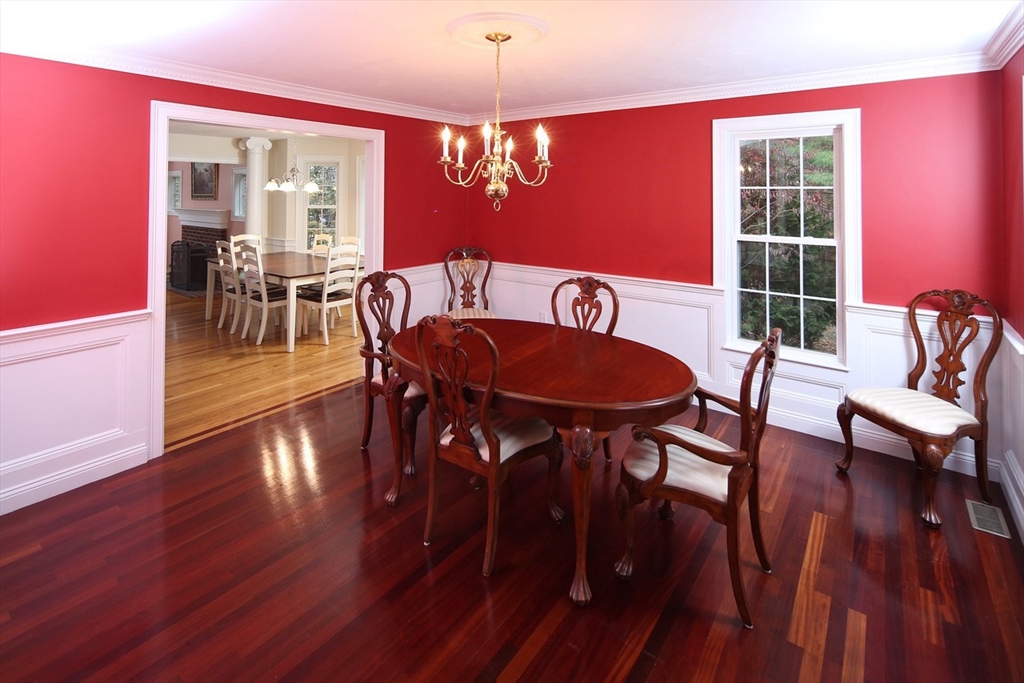 375 Webster Street Hanover, MA 02339 - Photo 12 of 24 a view of a dining room with furniture window and wooden floor