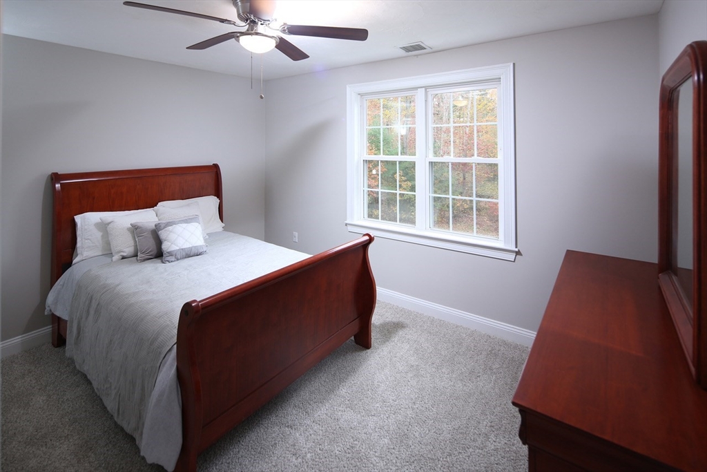 375 Webster Street Hanover, MA 02339 - Photo 16 of 24 a bedroom with a bed and window