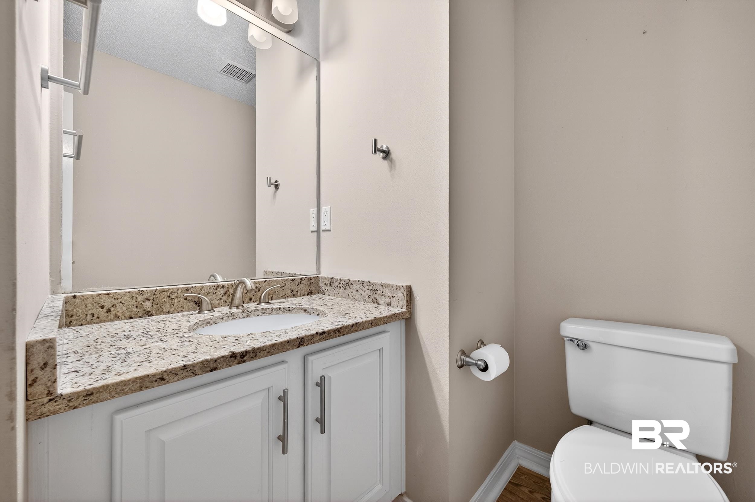 7050 Highpointe Place West Daphne, AL 36527 - Photo 31 of 66 Half bathroom featuring toilet and vanity