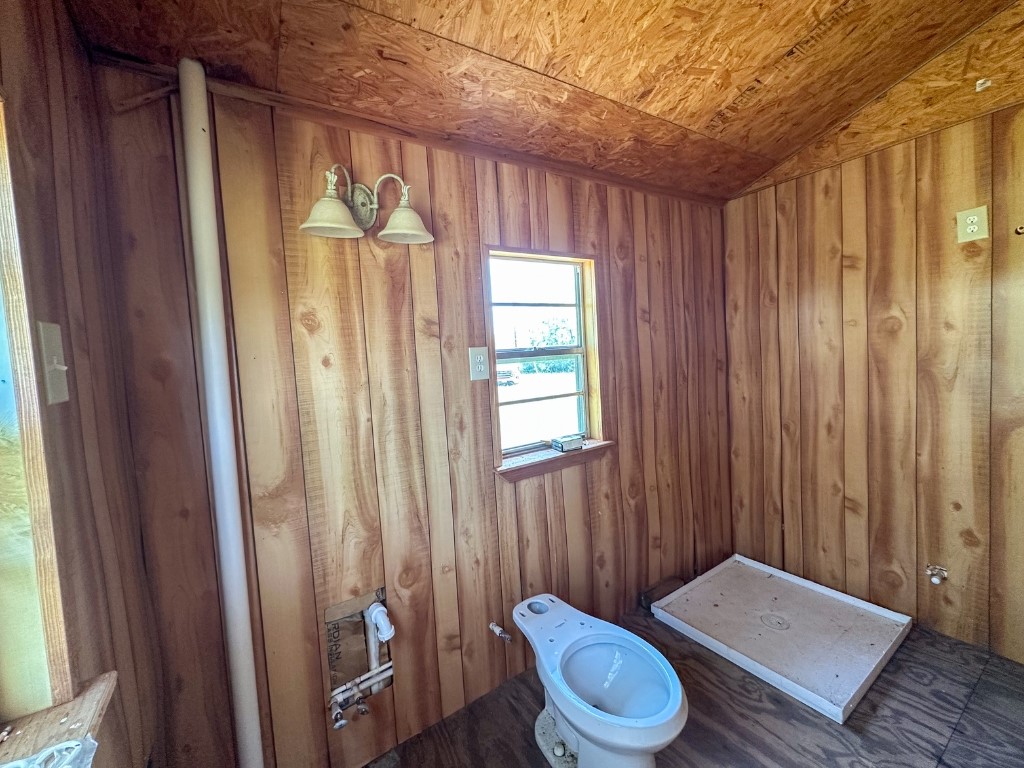 502 Robertson Road Smiley, TX 78159 - Photo 15 of 27 a bathroom with a toilet and a shower