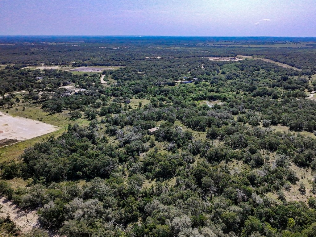 502 Robertson Road Smiley, TX 78159 - Photo 23 of 27 an aerial view of residential houses with outdoor space and trees