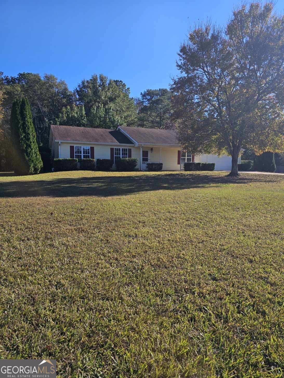 95 Meadows Road Newborn, GA 30056 - Photo 1 of 1 a front view of a house with a yard